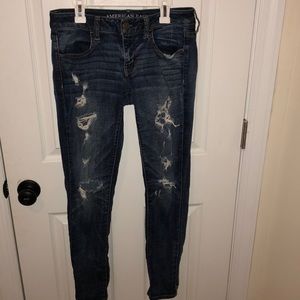 Mid-rise distressed American Eagle skinny jeans